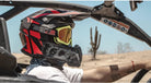 Rider in helmet and goggles on the East Cape UTV tour near Cabo San Lucas