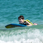 Boy with boogie surfboard - Beach Pass Wild Bay