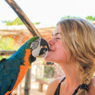 Parrot Kissing Girl - Animal Sanctuary