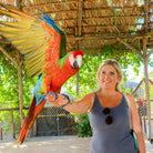 Woman with parrot - Animal Sanctuary