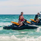 Woman smiling to the camera on a jet-ski in Cabo