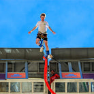 Boy falling from suspended gondola in bungee jump