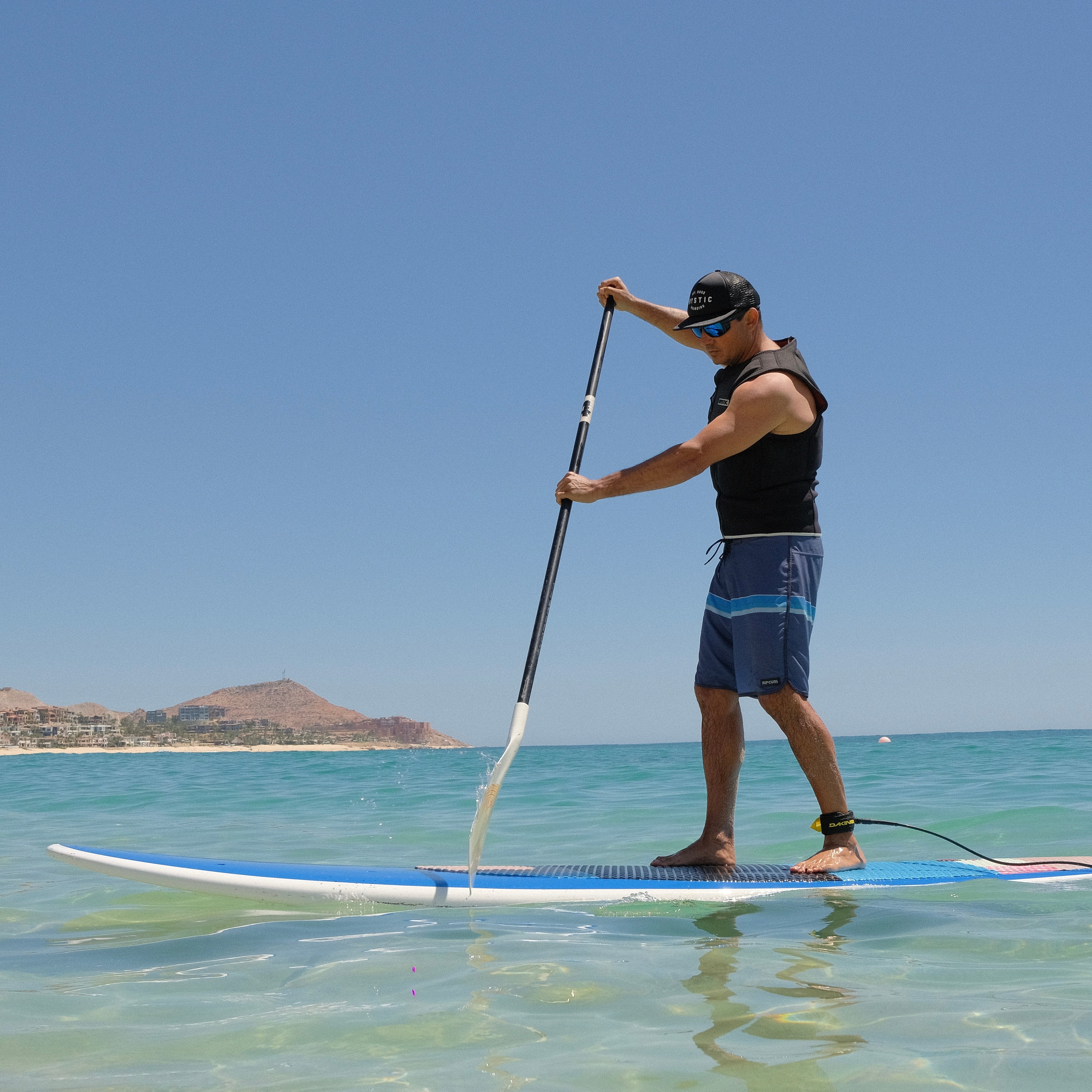 Man on Paddle Board - Beach Pass Wild Bay