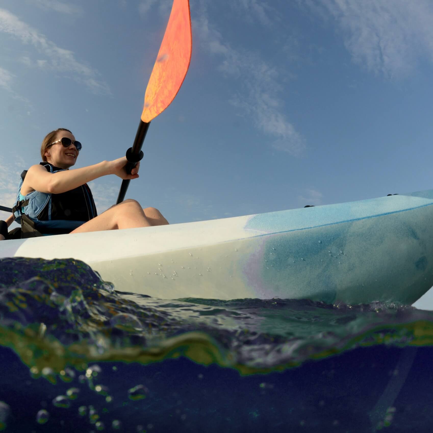 Woman on Kayak - Beach Pass Wild Bay