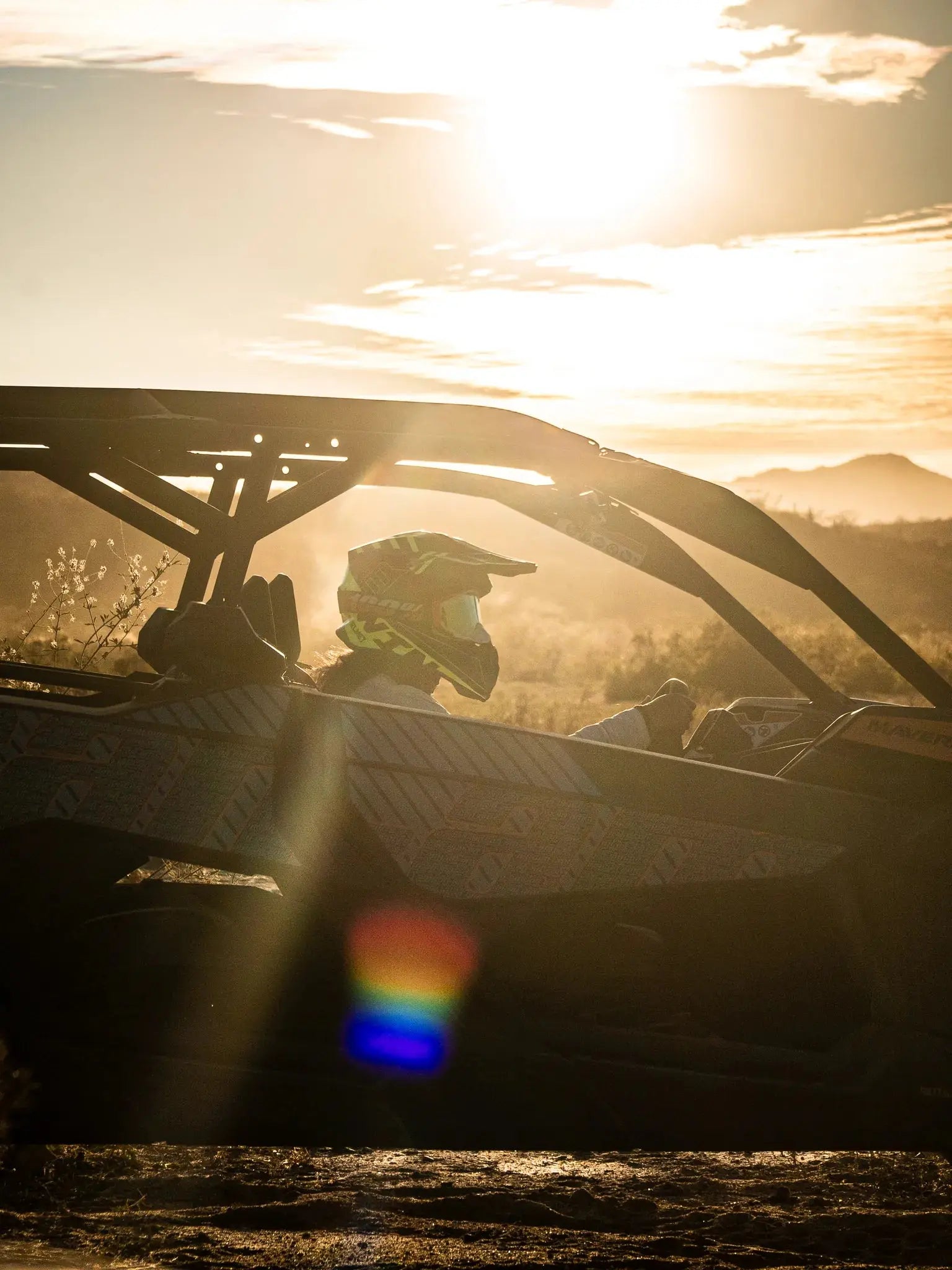 Can-Am Maverick UTV silhouetted at sunset on a Wild Canyon Adventures desert tour in Los Cabos