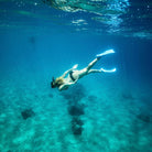 Woman snorkeling - Snorkel Rental