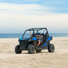 Couple on a Utv at beach - Ultimate Pass