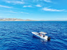 Pelican Cabo expedition boat on deep blue water off San José del Cabo