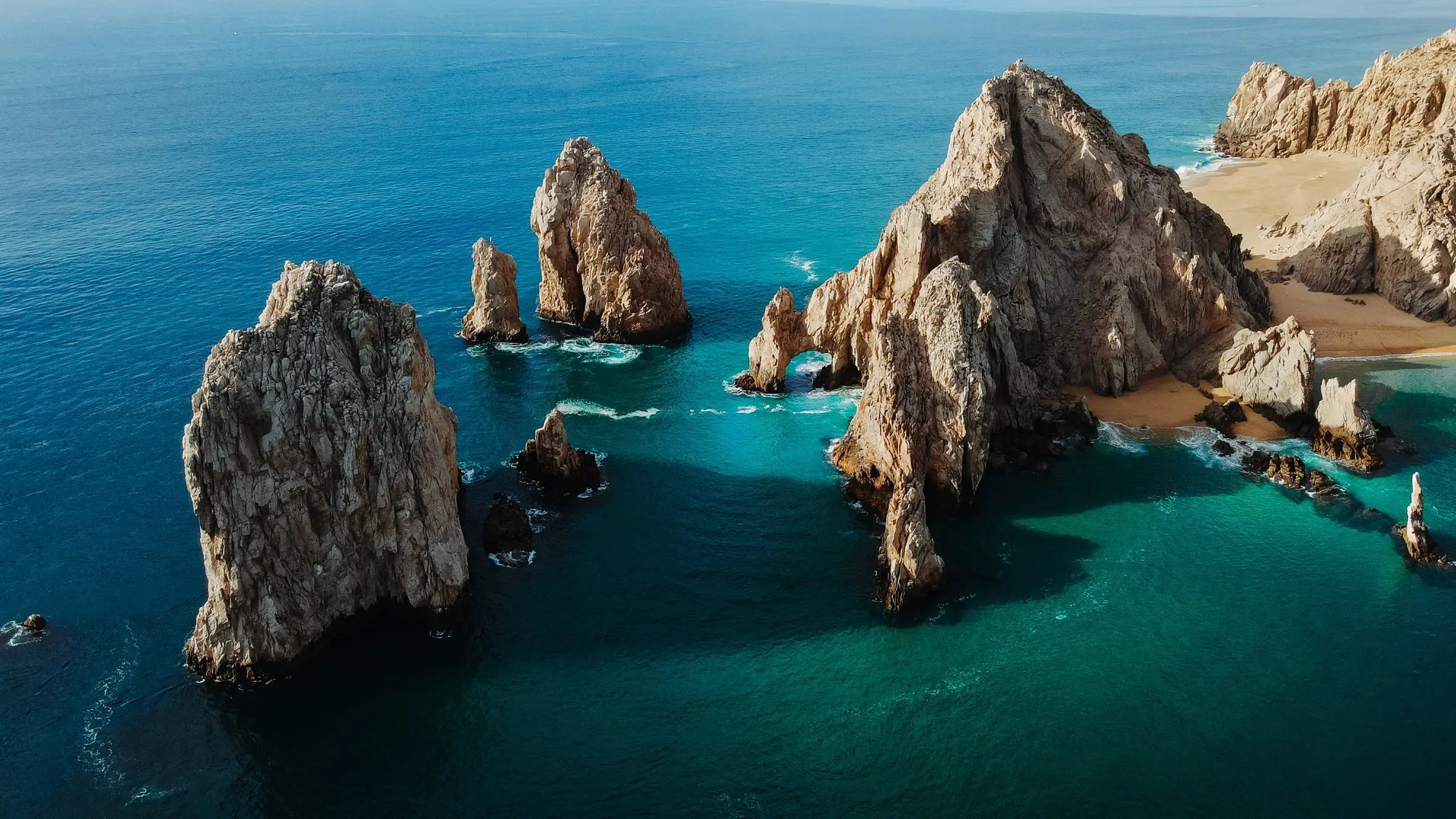 Aerial view of the Arch of Cabo San Lucas and Land's End rock formations